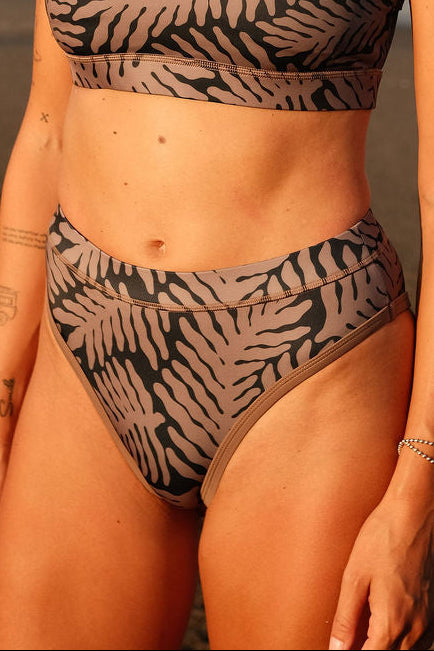 AFATO Rise Leg Bottom in Palm Rhythm print – front view showcasing a high-cut surfwear bikini bottom with tropical inspired design.