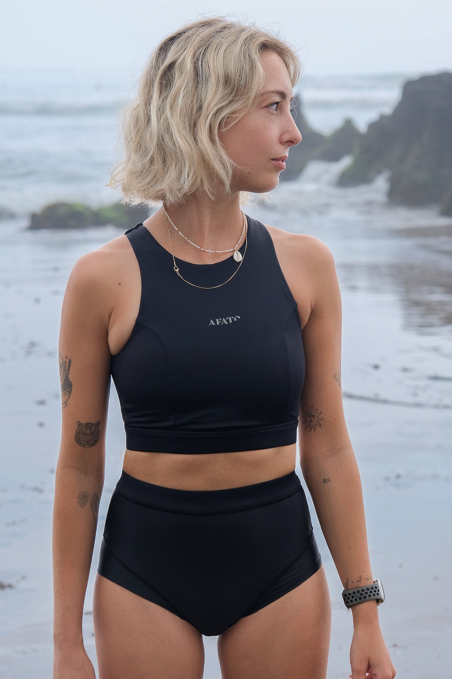 Matching AFATO set in black, perfect for surfing or relaxing by the beach.